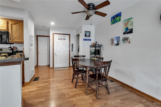 3 Keph Dr Unit 3, Amherst, NY 14228 - dining area with light wood-type flooring, ceiling fan, and recessed lighting