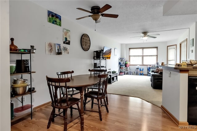 3 Keph Dr Unit 3, Amherst, NY 14228 - dining space with ceiling fan and wood finished floors