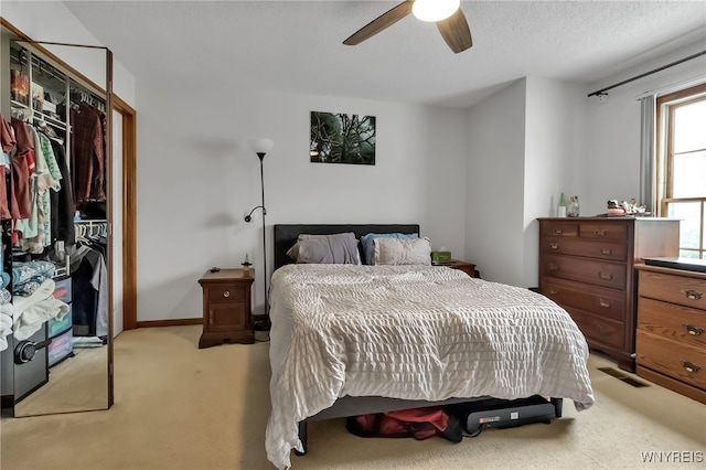 3 Keph Dr Unit 3, Amherst, NY 14228 - bedroom with light colored carpet, a closet, and a ceiling fan