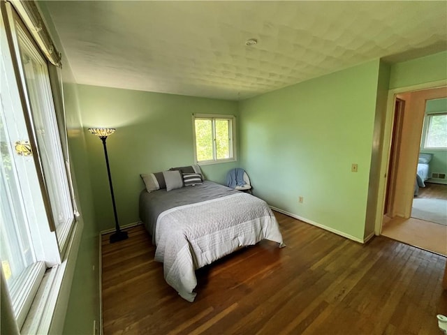 96 Vinal Ave, Irondequoit, NY 14609 - bedroom with baseboards and wood finished floors