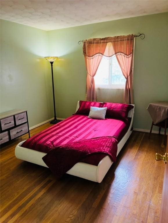 96 Vinal Ave, Irondequoit, NY 14609 - bedroom with wood finished floors and baseboards