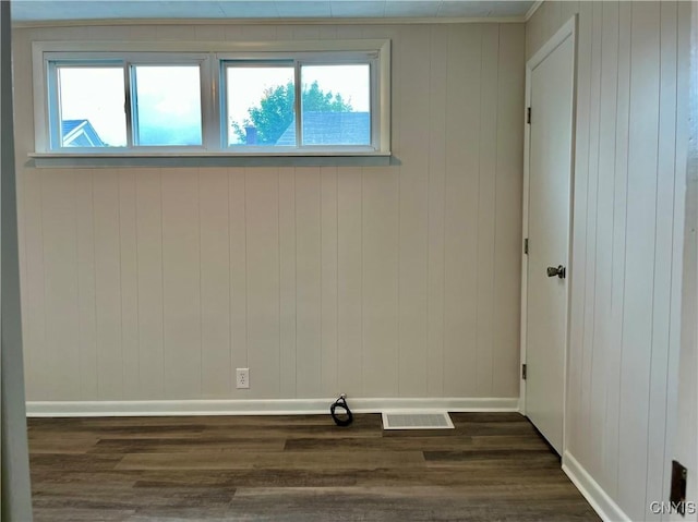 152 W Cayuga St, Oswego, NY 13126 - empty room with dark wood-style flooring and healthy amount of natural light