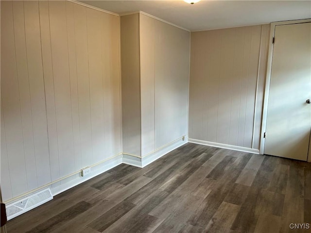 152 W Cayuga St, Oswego, NY 13126 - unfurnished room featuring dark wood-style floors and crown molding