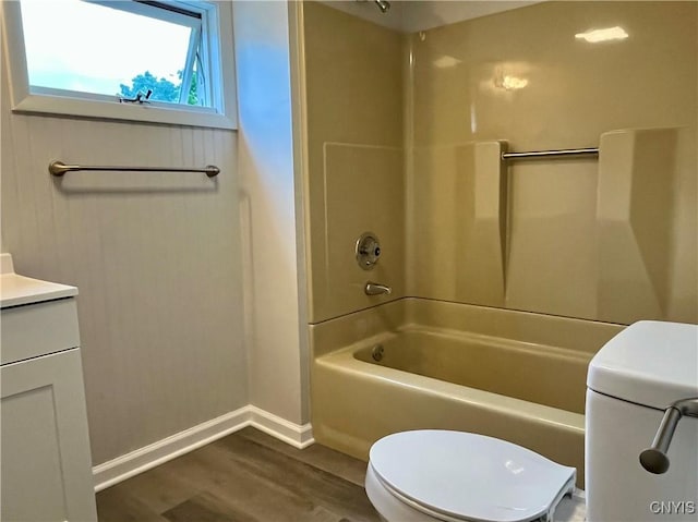 152 W Cayuga St, Oswego, NY 13126 - bathroom with bathtub / shower combination, wood finished floors, and vanity