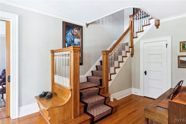 49 Academy St, Skaneateles, NY 13152 - stairs with wood finished floors and ornamental molding
