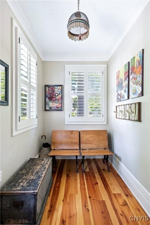 49 Academy St, Skaneateles, NY 13152 - living area with ornamental molding and wood finished floors