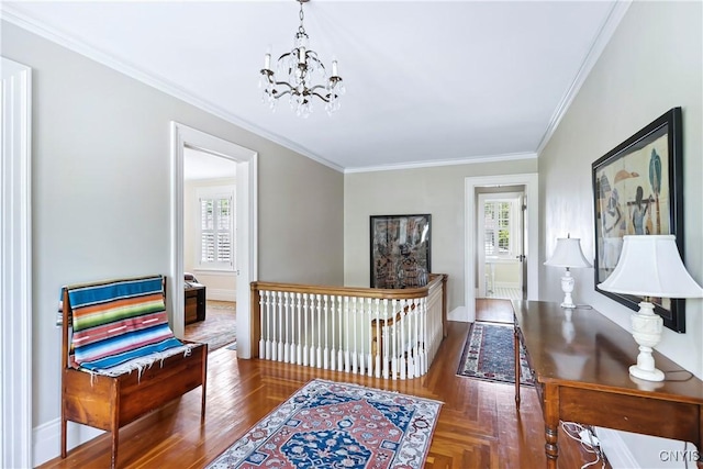 49 Academy St, Skaneateles, NY 13152 - hallway featuring a chandelier, crown molding, an upstairs landing, and wood finished floors