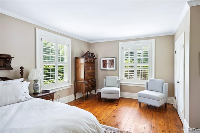 49 Academy St, Skaneateles, NY 13152 - bedroom with light wood-style flooring, multiple windows, and crown molding