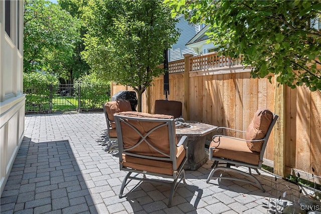 49 Academy St, Skaneateles, NY 13152 - view of patio / terrace featuring a fire pit
