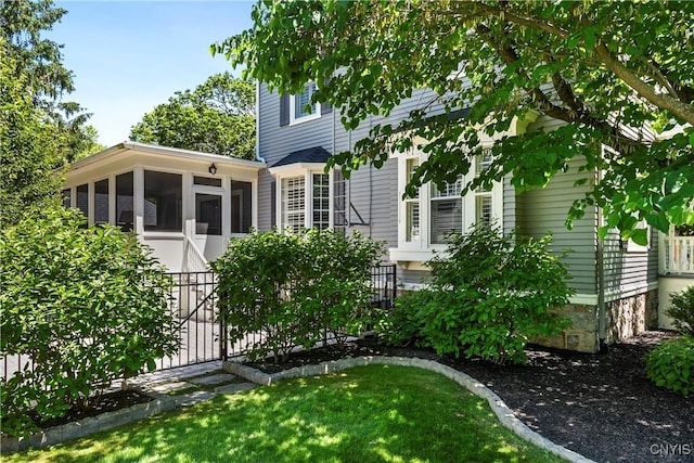 49 Academy St, Skaneateles, NY 13152 - back of property featuring a sunroom