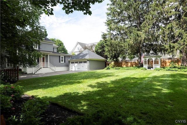 49 Academy St, Skaneateles, NY 13152 - view of yard with a garage and a gazebo