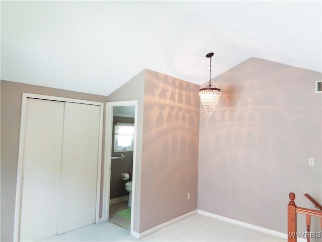 4315 Twilight Ln, Hamburg, NY 14075 - unfurnished bedroom featuring lofted ceiling, a chandelier, and a closet