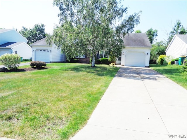 4315 Twilight Ln, Hamburg, NY 14075 - view of property hidden behind natural elements featuring a garage, concrete driveway, and a front lawn