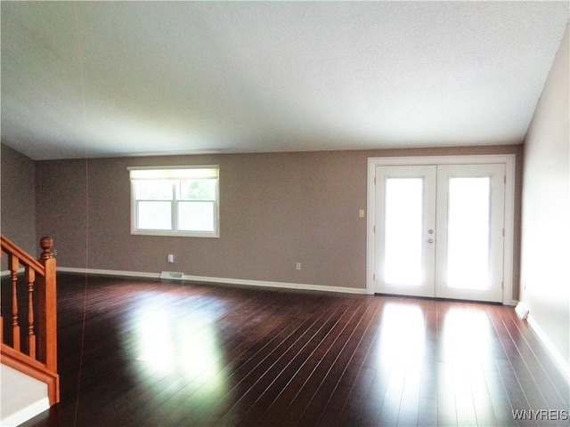 4315 Twilight Ln, Hamburg, NY 14075 - spare room with wood finished floors, stairway, and french doors