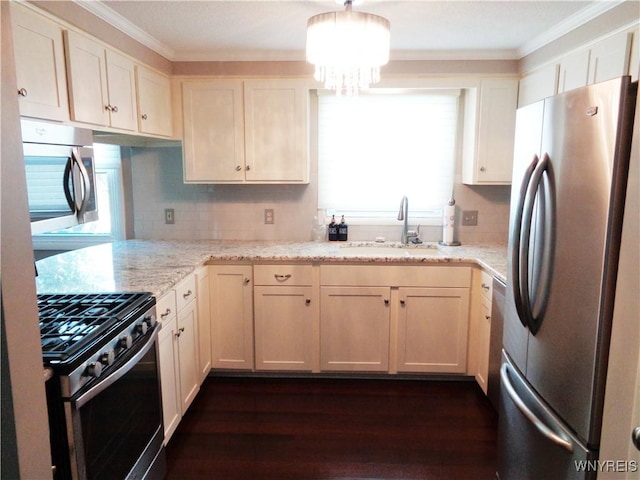 4315 Twilight Ln, Hamburg, NY 14075 - kitchen featuring appliances with stainless steel finishes, ornamental molding, decorative backsplash, light stone countertops, and dark wood-type flooring