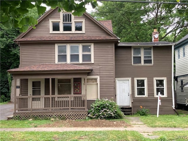 1011 Carbon St Unit 2, Syracuse, NY 13208 - view of front of home featuring covered porch, roof with shingles, a chimney, and entry steps