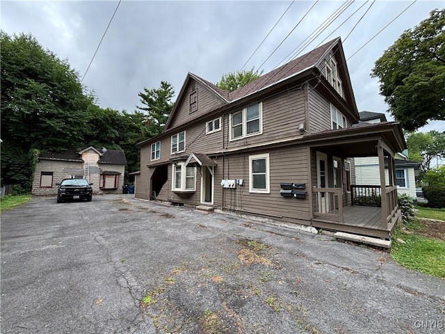 1011 Carbon St Unit 2, Syracuse, NY 13208 - view of front facade featuring an outdoor structure