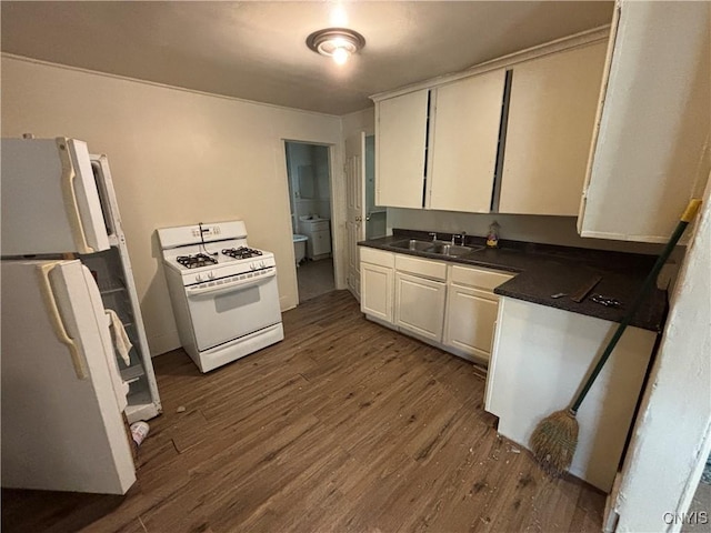 1011 Carbon St Unit 2, Syracuse, NY 13208 - kitchen featuring white appliances, dark wood-style floors, dark countertops, and white cabinetry