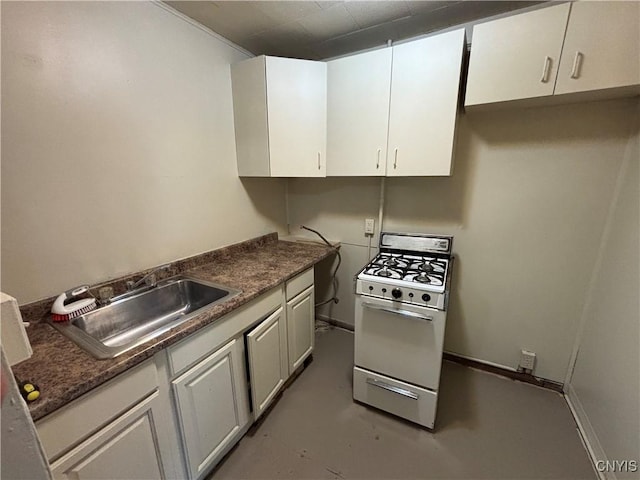 1011 Carbon St Unit 2, Syracuse, NY 13208 - kitchen with white gas stove, white cabinetry, and finished concrete flooring