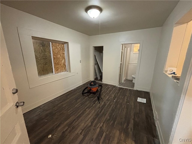 1011 Carbon St Unit 2, Syracuse, NY 13208 - unfurnished room with wood finished floors and baseboards