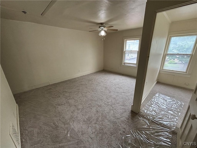 1011 Carbon St Unit 2, Syracuse, NY 13208 - carpeted empty room with ceiling fan
