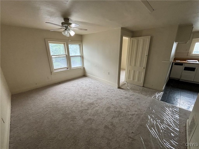 1011 Carbon St Unit 2, Syracuse, NY 13208 - unfurnished bedroom featuring ceiling fan and baseboards