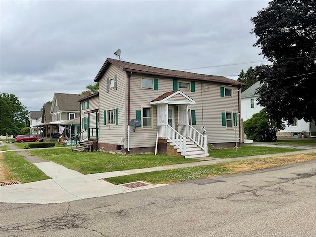 27 Chestnut Ave, North Dansville, NY 14437 - view of property featuring a front yard