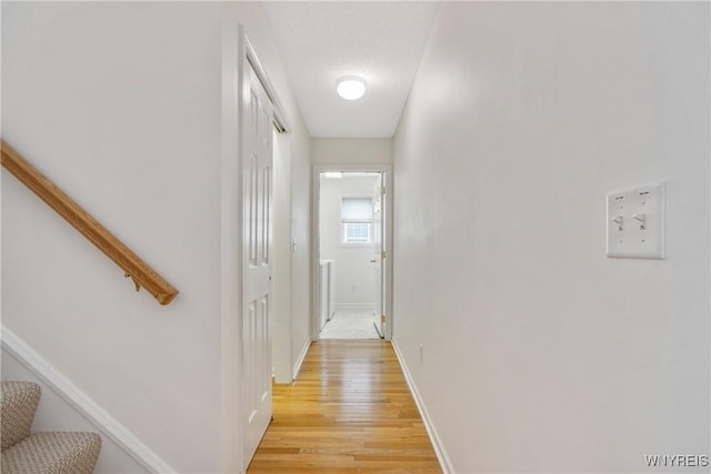 25 Caspian Ct, Amherst, NY 14228 - corridor with stairway and light wood-style flooring