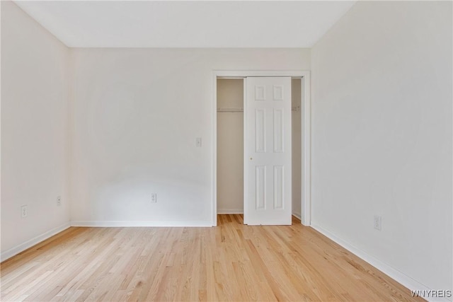 25 Caspian Ct, Amherst, NY 14228 - unfurnished bedroom with light wood-style floors and a closet