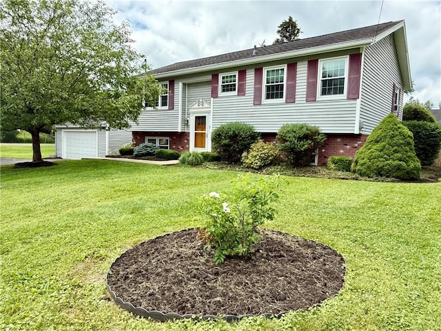5 Riverside Ave, Oneonta, NY 13820 - bi-level home with a front yard, a garage, and an outbuilding