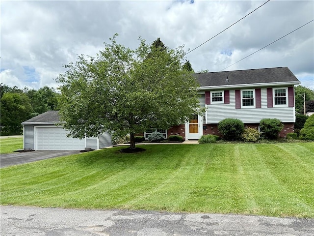 5 Riverside Ave, Oneonta, NY 13820 - view of front of property featuring a garage, a front lawn, and asphalt driveway
