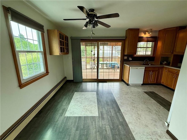 5 Riverside Ave, Oneonta, NY 13820 - kitchen with baseboard heating, white dishwasher, a ceiling fan, glass insert cabinets, and brown cabinetry
