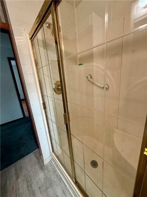 5 Riverside Ave, Oneonta, NY 13820 - full bath featuring a stall shower and wood finished floors