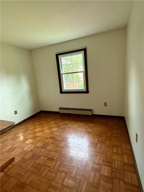 5 Riverside Ave, Oneonta, NY 13820 - spare room with baseboard heating and baseboards