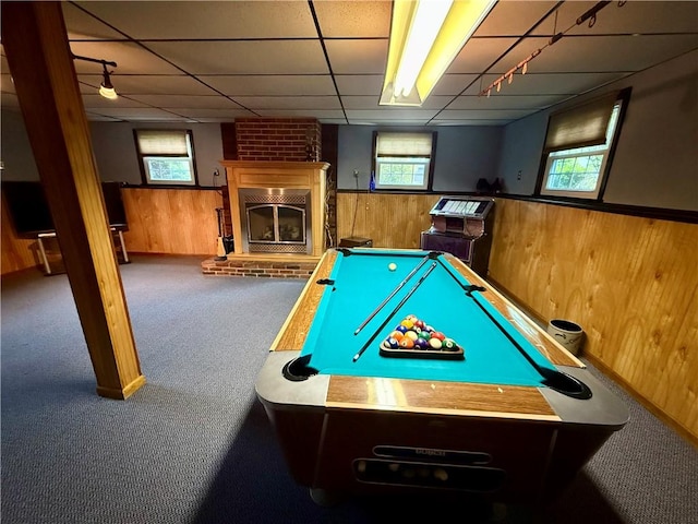 5 Riverside Ave, Oneonta, NY 13820 - game room with wooden walls, carpet flooring, wainscoting, plenty of natural light, and a fireplace