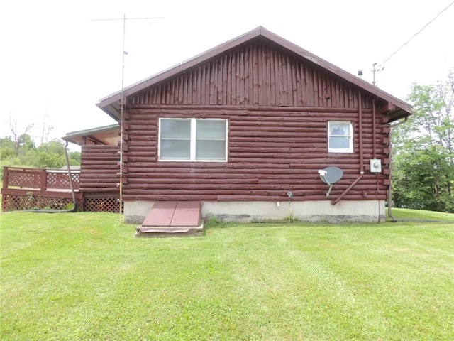 751 County Rd 17, Bainbridge, NY 13733 - back of house featuring log siding, a lawn, a wooden deck, and board and batten siding