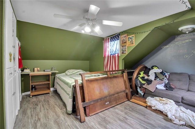 3410 Bullis Rd, Elma, NY 14059 - bedroom featuring wood finished floors, ceiling fan, and lofted ceiling