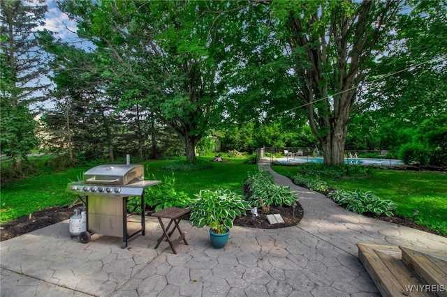 3410 Bullis Rd, Elma, NY 14059 - view of patio featuring area for grilling, an outdoor pool, and view of scattered trees