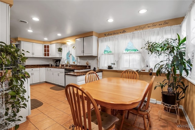 3410 Bullis Rd, Elma, NY 14059 - dining space with light tile patterned floors and recessed lighting
