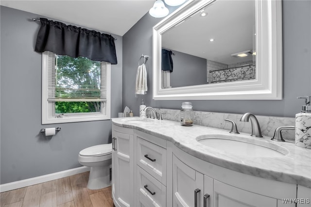 3410 Bullis Rd, Elma, NY 14059 - bathroom with double vanity, wood finished floors, and a shower with shower curtain
