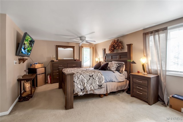 3410 Bullis Rd, Elma, NY 14059 - bedroom featuring light colored carpet, ceiling fan, and freestanding refrigerator