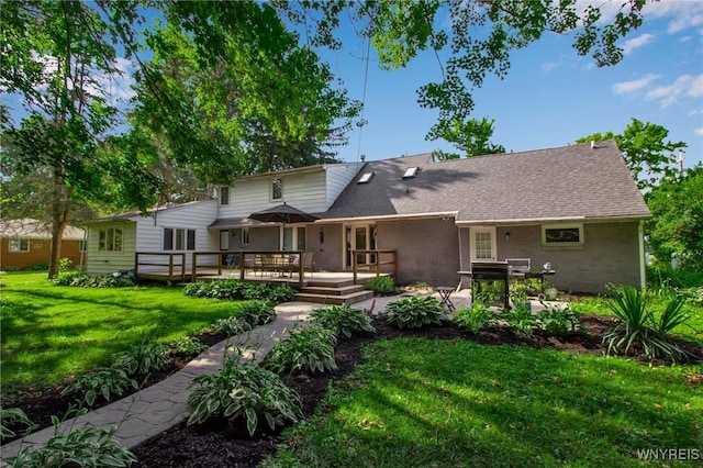 3410 Bullis Rd, Elma, NY 14059 - back of house featuring a yard, a wooden deck, a patio, and roof with shingles