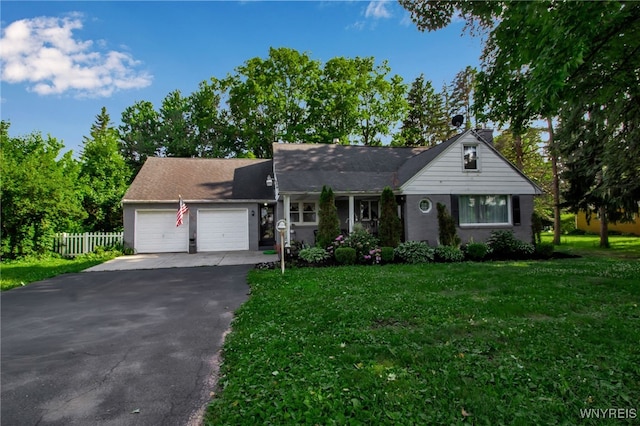 3410 Bullis Rd, Elma, NY 14059 - view of front of home with asphalt driveway and a garage