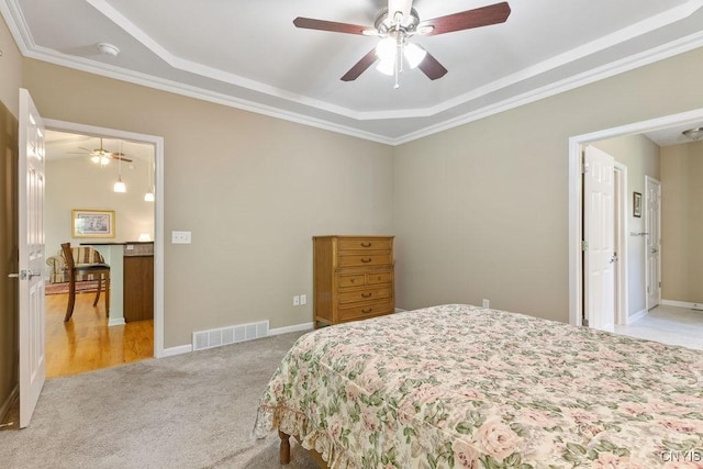 8449 Newbury Pl, Clay, NY 13041 - carpeted bedroom featuring a tray ceiling, crown molding, and ceiling fan