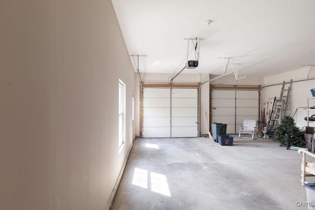 8449 Newbury Pl, Clay, NY 13041 - garage featuring a garage door opener