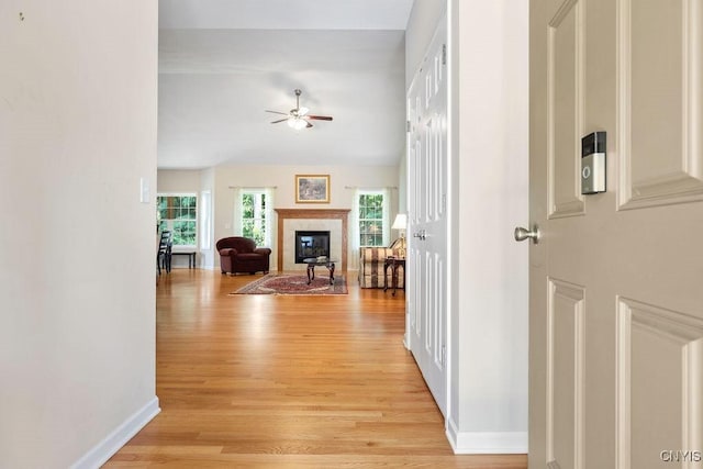 8449 Newbury Pl, Clay, NY 13041 - corridor featuring light wood-type flooring and baseboards