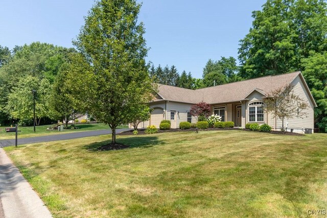 8449 Newbury Pl, Clay, NY 13041 - view of front facade featuring a front lawn and an attached garage