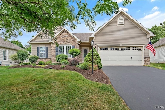 115 Shire Way, Camillus, NY 13031 - view of front of home featuring stone siding, driveway, a front lawn, and a garage