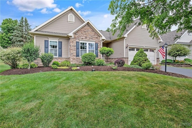 115 Shire Way, Camillus, NY 13031 - view of front of property with stone siding, a front lawn, concrete driveway, and a garage