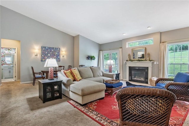 115 Shire Way, Camillus, NY 13031 - carpeted living area featuring a glass covered fireplace and lofted ceiling